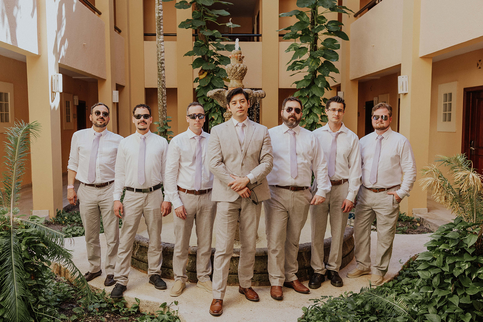 Groom Evan getting ready before his Riviera Maya destination wedding