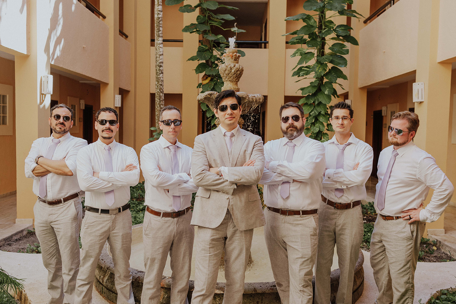 Groom Evan getting ready before his Riviera Maya destination wedding